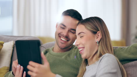 Home,-love-and-couple-on-a-couch