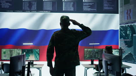 russian army soldier presenting the official salute in operations room