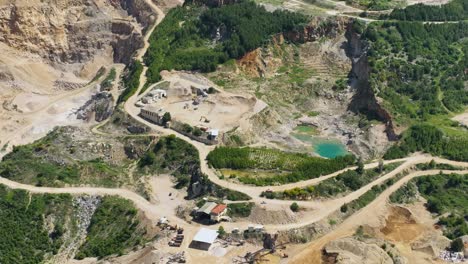 excavation site on mountainside digging the face of the mountain