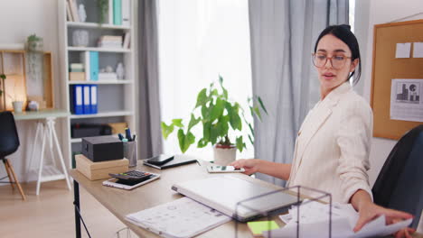 corporate employee takes documents and leaves office