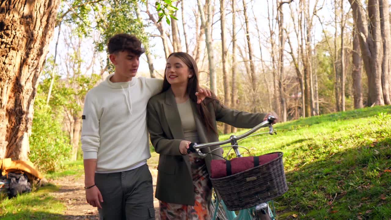 Romantic Couple Enjoying a Bike Ride in the Park