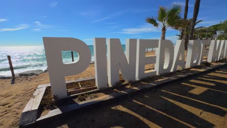 White-sign-Paseo-del-Mar-in-Pineda-de-Mar,-in-Costa-del-Maresme-Catalonia-malgrat