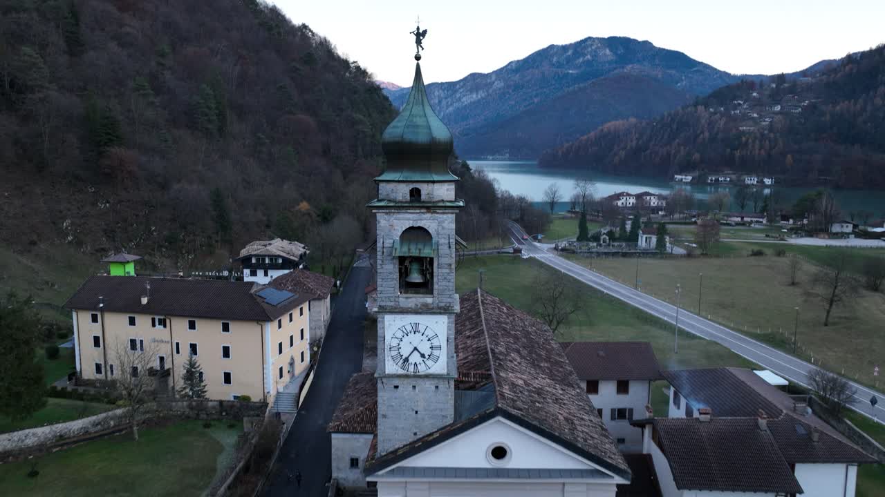 Aerial Crane Forward Drone shot of Bell's Tower Church in Pieve di Ledro - Trento