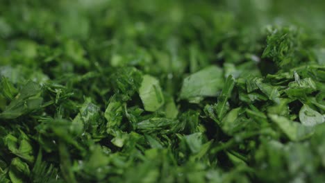 close-up panning shot of fine minced parsley