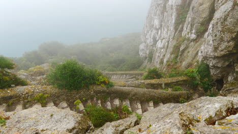 Revealing-Shot-Of-Mediterranean-Steps-With-Misty-Background-In-Gibraltar