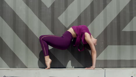 woman performing backbend yoga pose