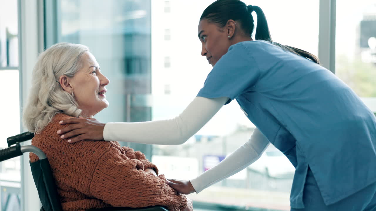 Caregiver, help and senior woman in wheelchair