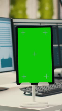 vertical video contemporary office space equipped with green screen on tablet