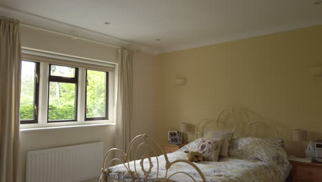 downward tilt shot of a modern looking bedroom in a rural home