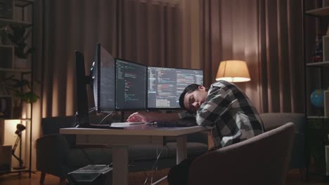 programmer taking a nap at their desk