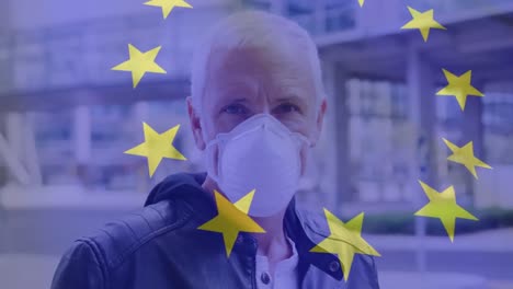 Animation-of-flag-of-eu-waving-over-man-in-face-masks