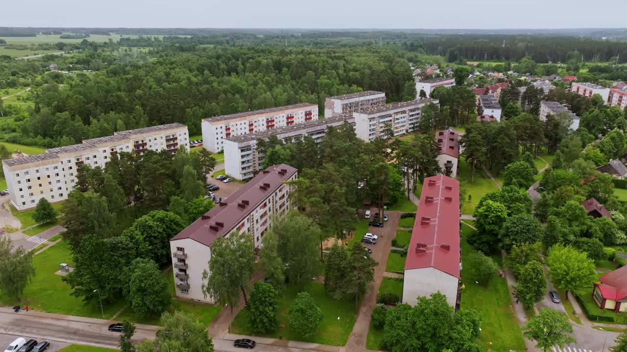 Drone Captures Rain Falling Over Broceni Town With Residential Housing Blocks