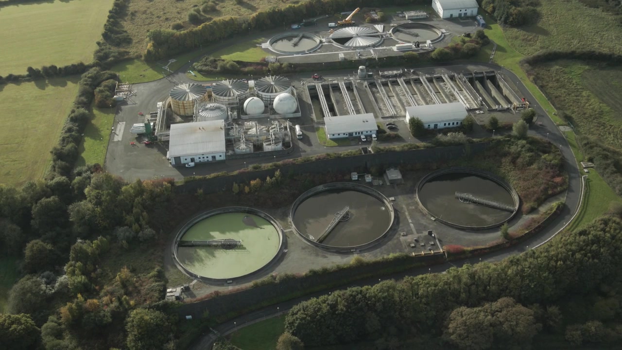 Drogheda wastewater treatment plant surrounded by greenery in ireland , aerial view
