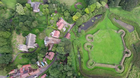 aerial video footage of the remains of bolingbroke castle a 13th century hexagonal castle, birthplace of the future king henry iv, with adjacent earthwork