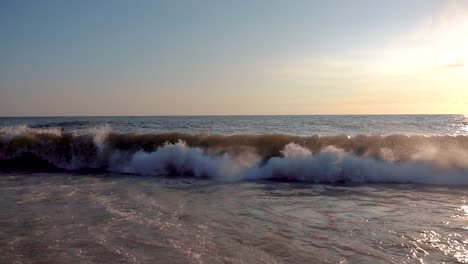 powerful waves at sunset