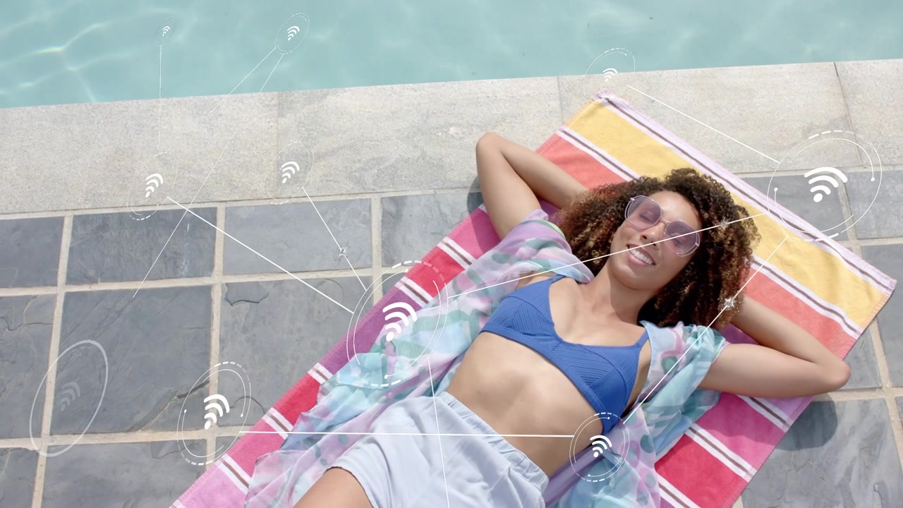 Woman lying on pool towel, WiFi icons appearing, clustering around her, mapping technology