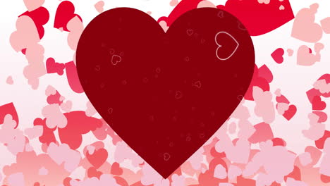 corazón rojo con animación de corazones más pequeños sobre fondo rosa y blanco