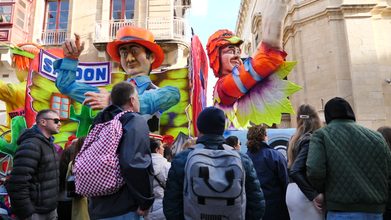 Malta Carnival Parade: Colorful Floats and Crowds