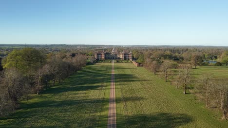 aerial view down vast country house garden leading to picturesque hatfield house manor estate
