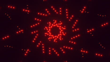 vibrantly spiraling pattern of red dots in circular formation