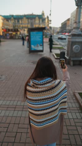 woman having a video call on the street