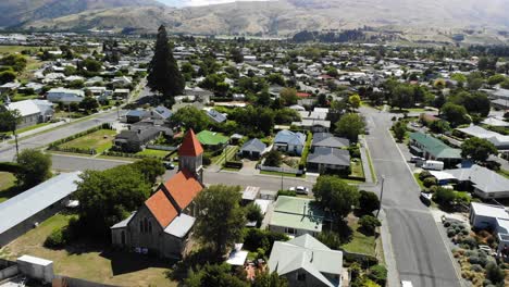 aerial view of catholic church and neighborhood in cromwell, new zealand