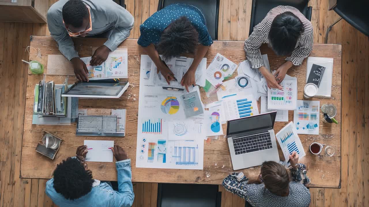 Team collaboration on project analysis in a modern workspace setting