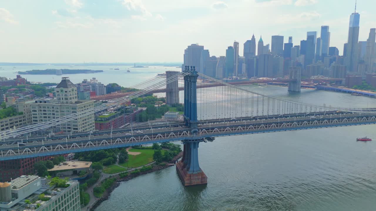 Aerial view of traffic flowing on iconic Manhattan Bridge over East River in NYC