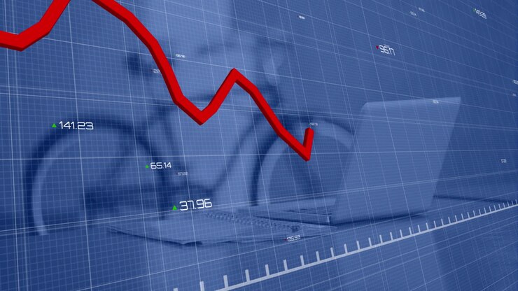 Data processing and red line graph over computer on desk and bicycle