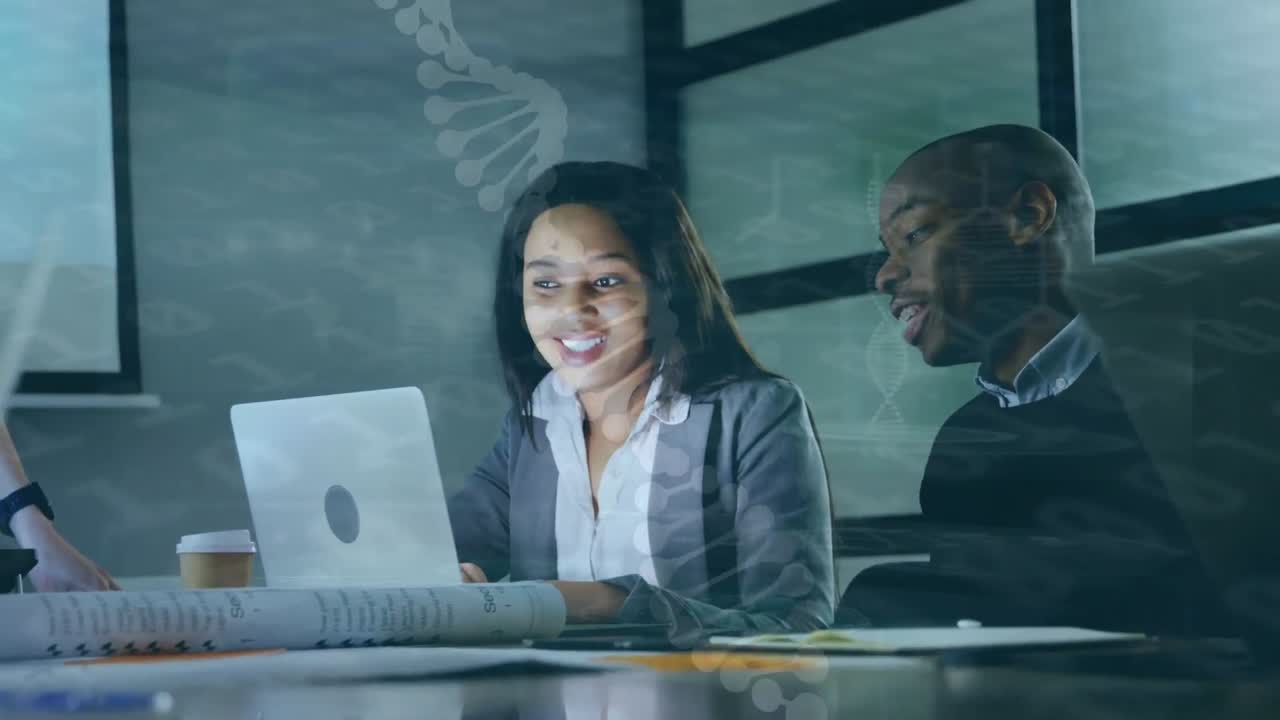 Animation of scientific data over diverse female and male coworkers using laptop