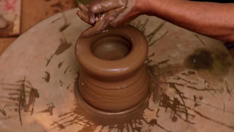 potter at work makes ceramic dishes. india, rajasthan.