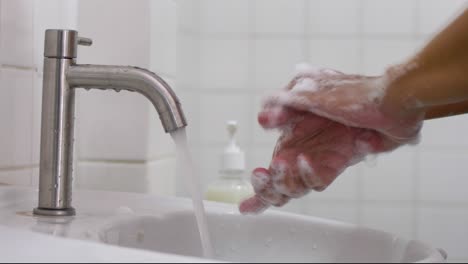 wash hands with soap. washing frequently preventing covid19 and germs. 60fps