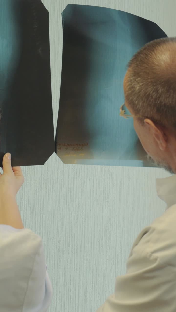 Medical Professionals Analyzing X-rays