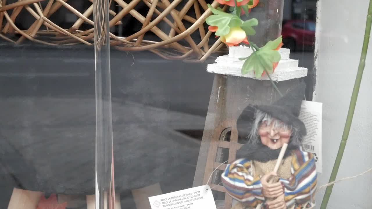 Halloween themed window shop in October.