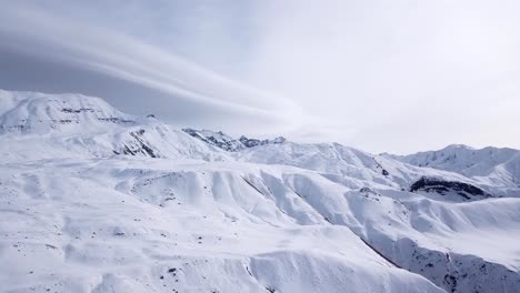 Alamkuh-mountain-the-second-highest-peak-after-Damavand-in-Iran-in-Winter-season-covered-by-snow-in-sunny-day-in-alamut-qazvin-beautiful-scenic-landscape