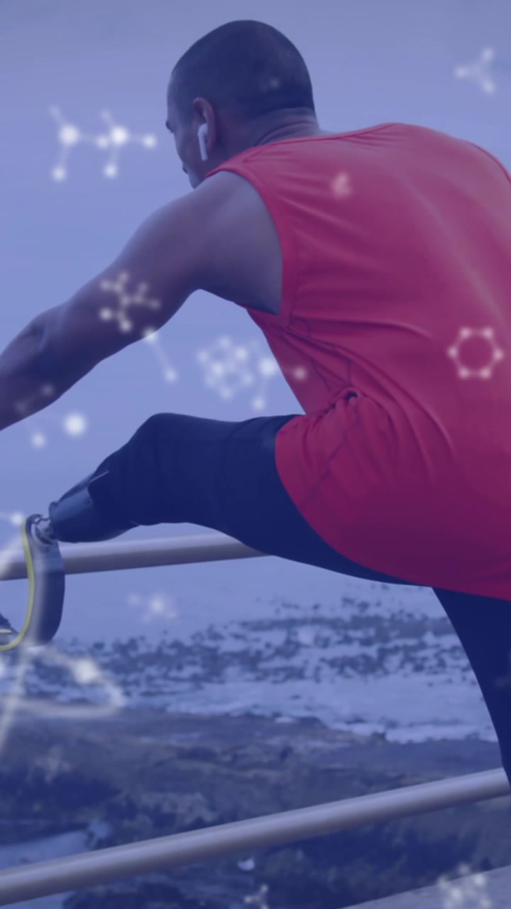 Animacja sieci komunikacyjnych na tle męskiego sportowca z protezą biegową rozciągającego się na zewnątrz