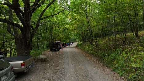 tourist car parking at cole mountain during sunny day. dolly forward shot. virginia, usa.