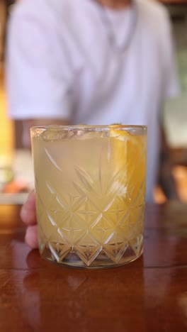 bartender serving a refreshing cocktail