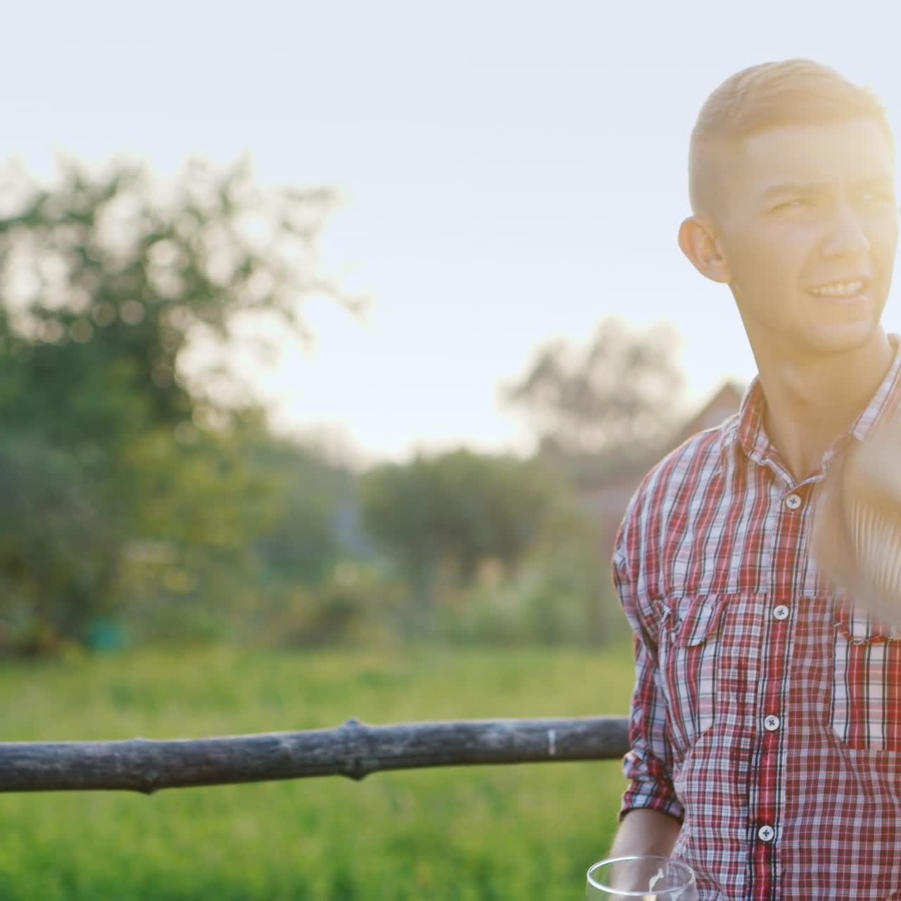 A Tired Farmer Drinks Beer On A Hot Day 1 Free Stock Video Footage Download  Clips Agriculture