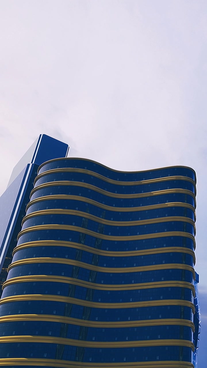 Edifício com design curvo e fachada azul sob céu claro em um cenário urbano.