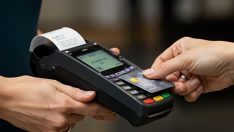 making a payment with a credit card at a point of sale terminal