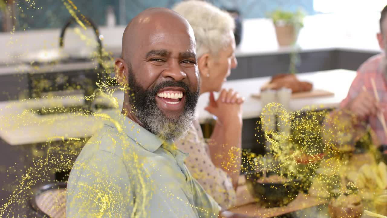 Man laughing, turning to cam, gold sparks sweeping left and swirling around him, highlighting food