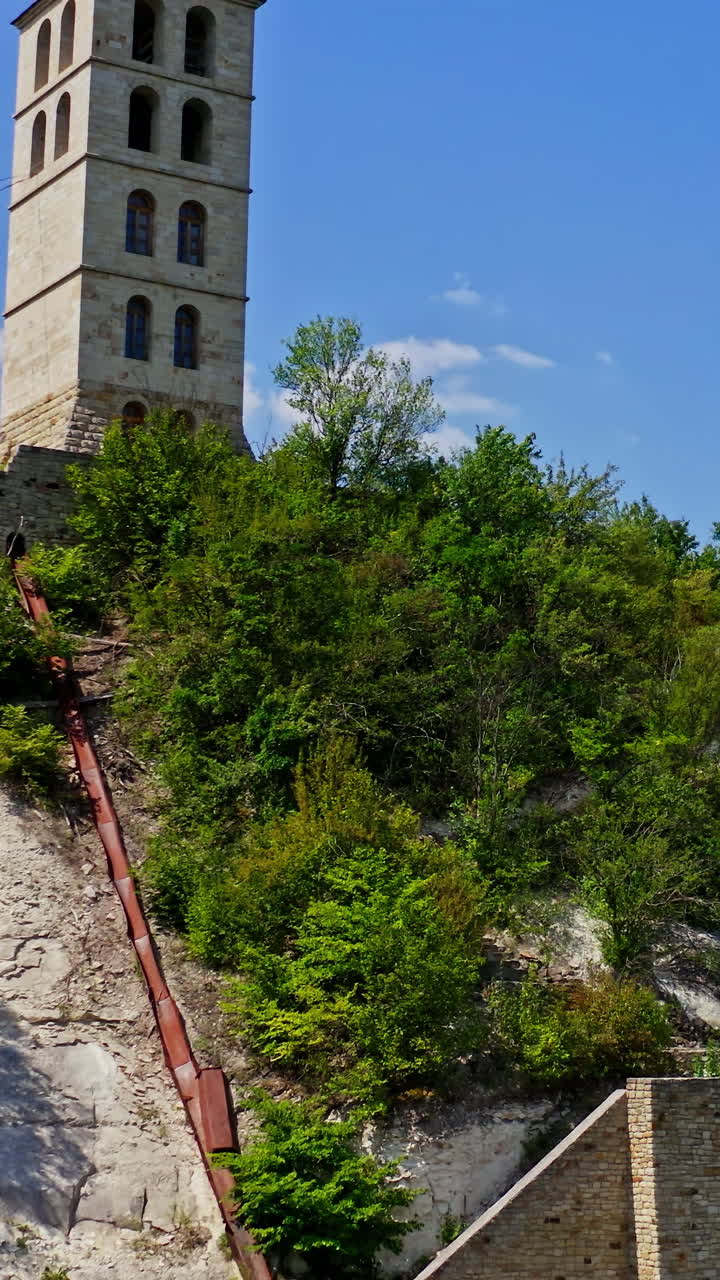 Ancient Orthodox Church. Aerial view of orthodox church in mountain. Vertical video