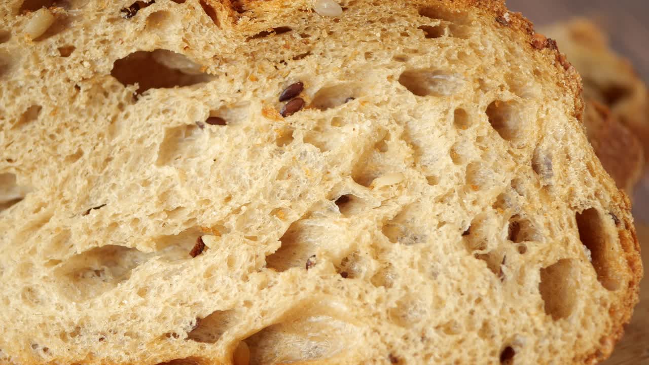 Close-up of a slice of seeded bread