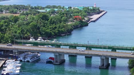 Aerial-view-showing-traffic-on-bridge-crossing-Rio-Romana-in-La-Romana-City