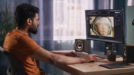 person editing a photo of an astronaut on a computer