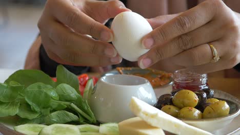 woman eating a turkish breakfast