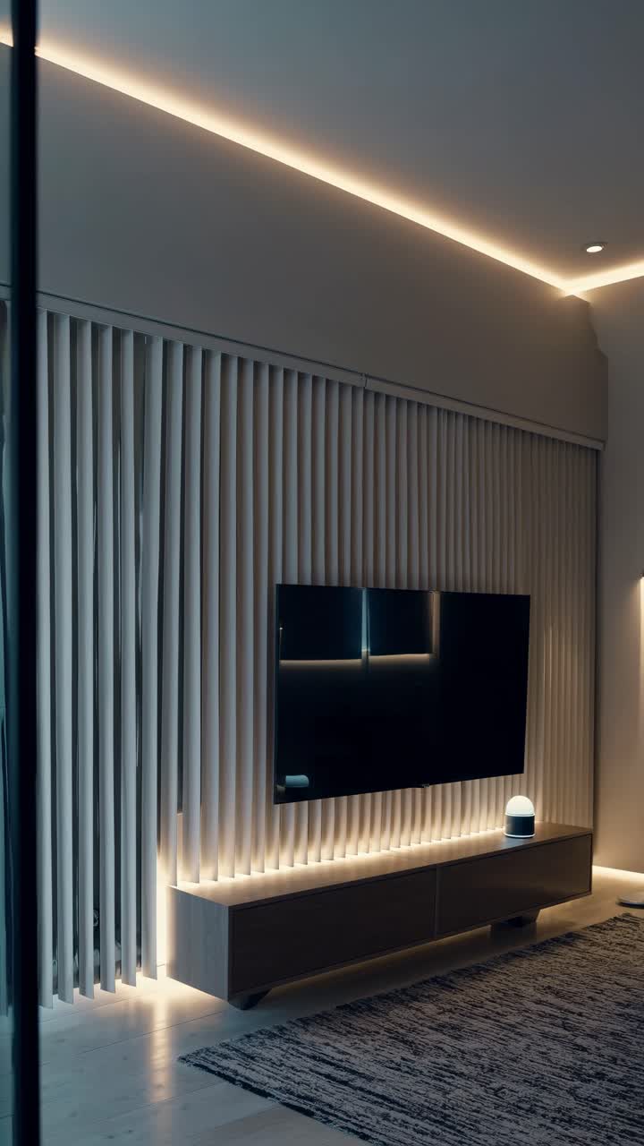 Modern living room with sleek decor, featuring a wall-mounted TV