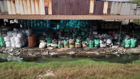 Toxic-Waste-Water-Pollution,-Recycling-Electronic-e-Waste-Processing-Facility-Contaminated-Ground-Water-Hazardous-Toxic-Pollutants-Overseas-Disposal