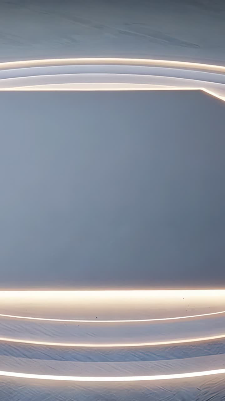 Vertical video: Upon activation, lighting up LED strips across gray wall in room, minimalist decor